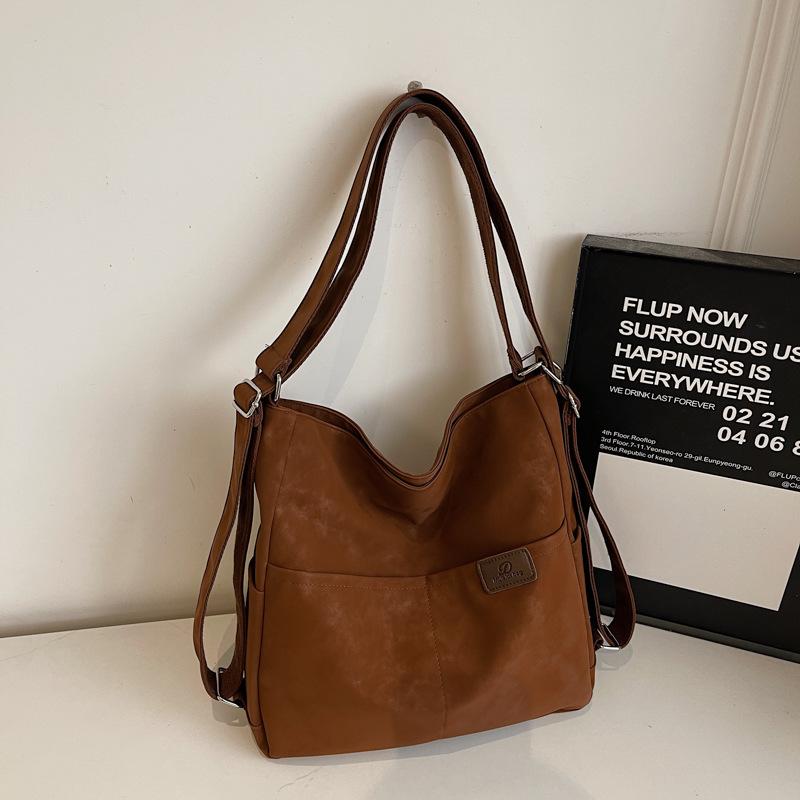 Commuter large-capacity three-purpose bag trendy fashion simple texture shoulder bag messenger bag коричневый