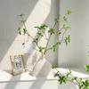 Green Plants Ceramic Vase with Hanging Bells and Artificial Flowers - Home Decoration Props