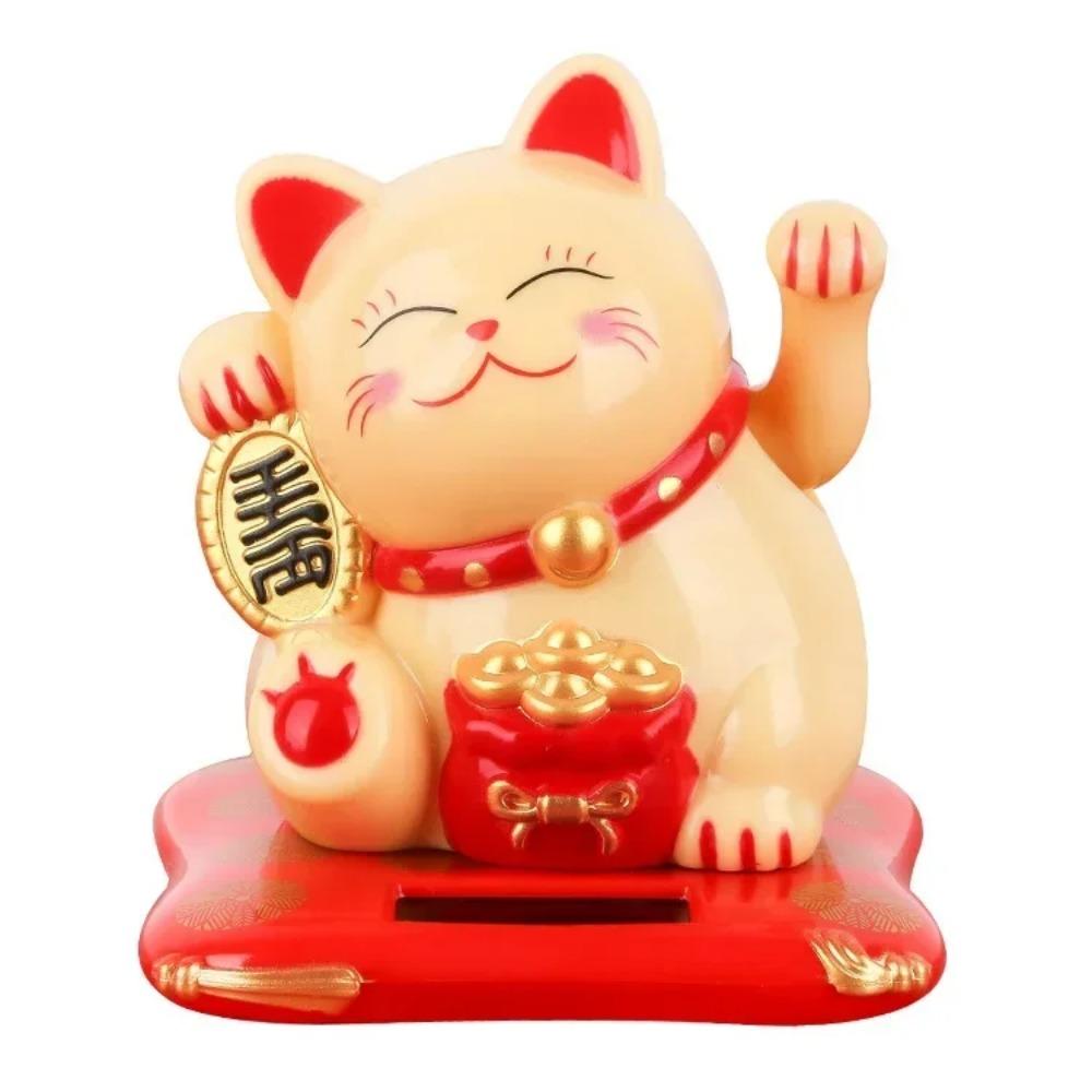 Gatto fortunato Maneki Neko alimentato ad energia solare che accoglie il gatto fortunato cinese che saluta con la mano e fa cenno di essere una statuetta di gatto della fortuna per l'arredamento della casa