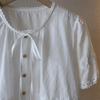 2025 Summer Korean Round Neck Tie-Up Embroidered Cutout Short Sleeve Women's Top