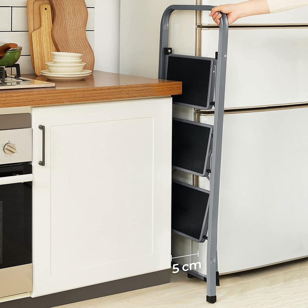 SONGMICS 3-Step Ladder, Folding Ladder, 20 cm Wide Steps Covered with Non-Slip Rubber, Rubber Feet, Handrail, Max. Static Load 150 kg, Steel