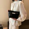 Modern Soft Sided Rectangular Makeup Bag For Women Featuring Stylish Stitching Elements