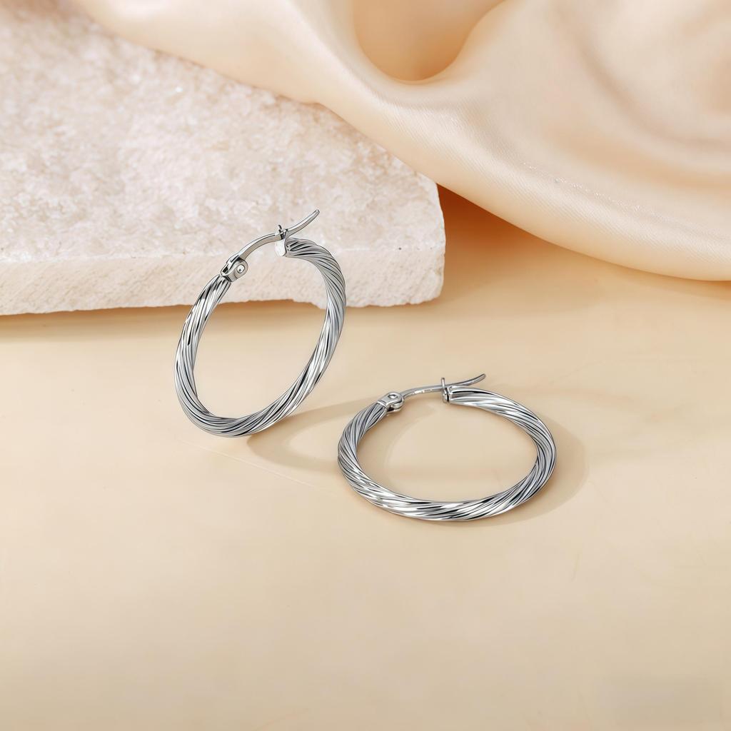 2025 Elegant Titanium Steel Needle-Woven Hoop Earrings - High-End, Colorfast Design for Women