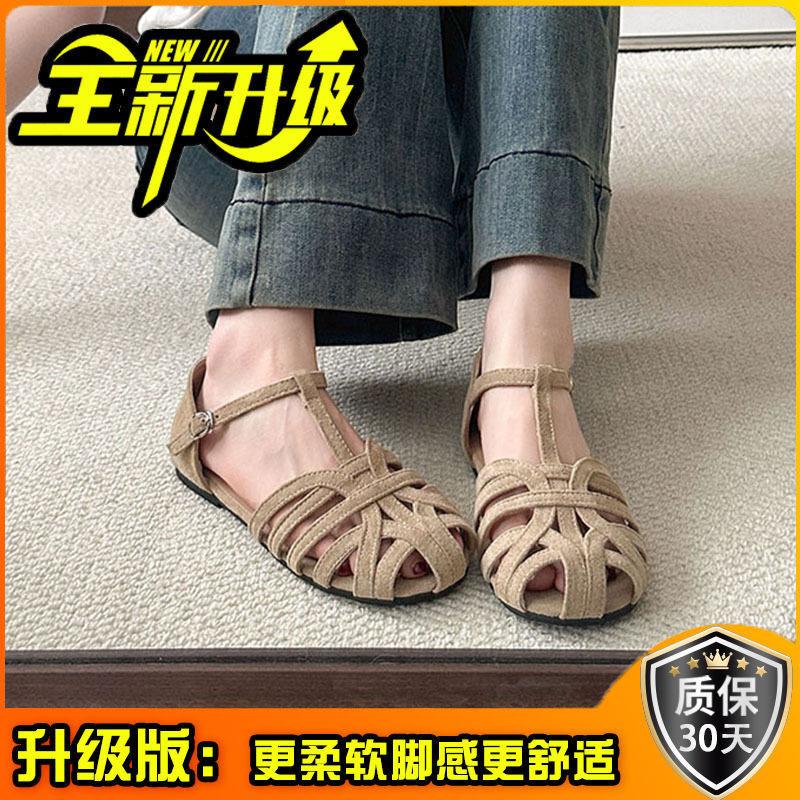Woven flat-soled sandals women's summer retro outer wear hollowed-out baotou pig cage shoes one-button Roman shoes