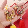 Diamond-Studded Auspicious Dragon Pendant with Red and Gold Tassel