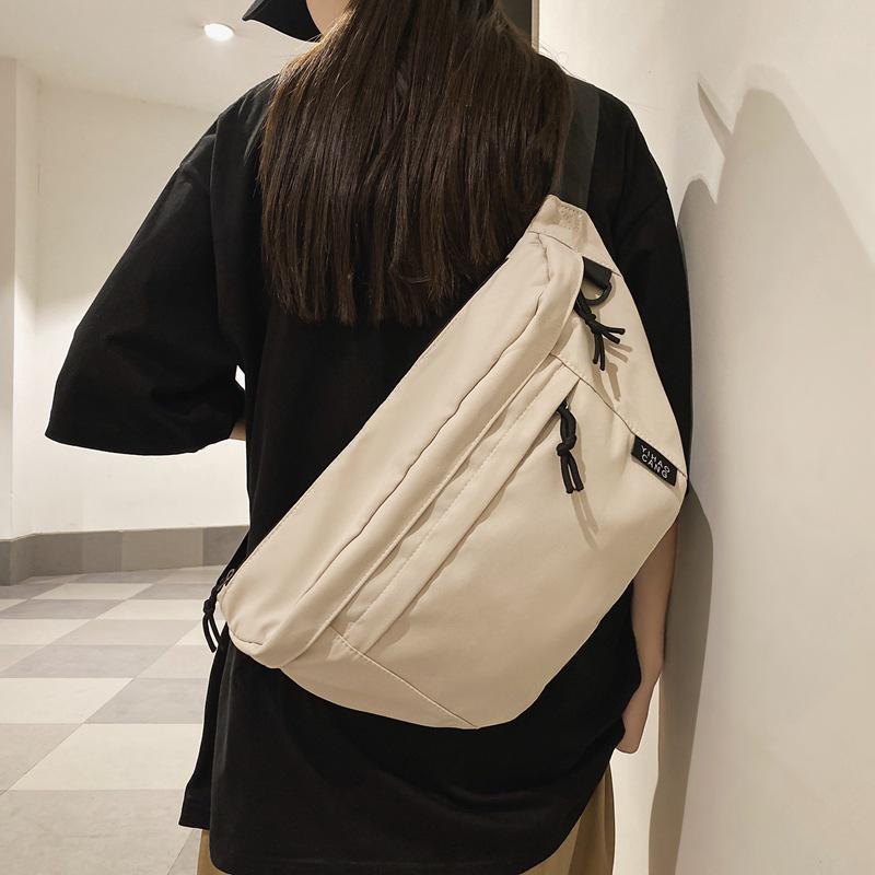 Large Capacity Unisex Chest & Crossbody Bag: Trendy Japanese Casual Style, Perfect for Workwear & Cycling.