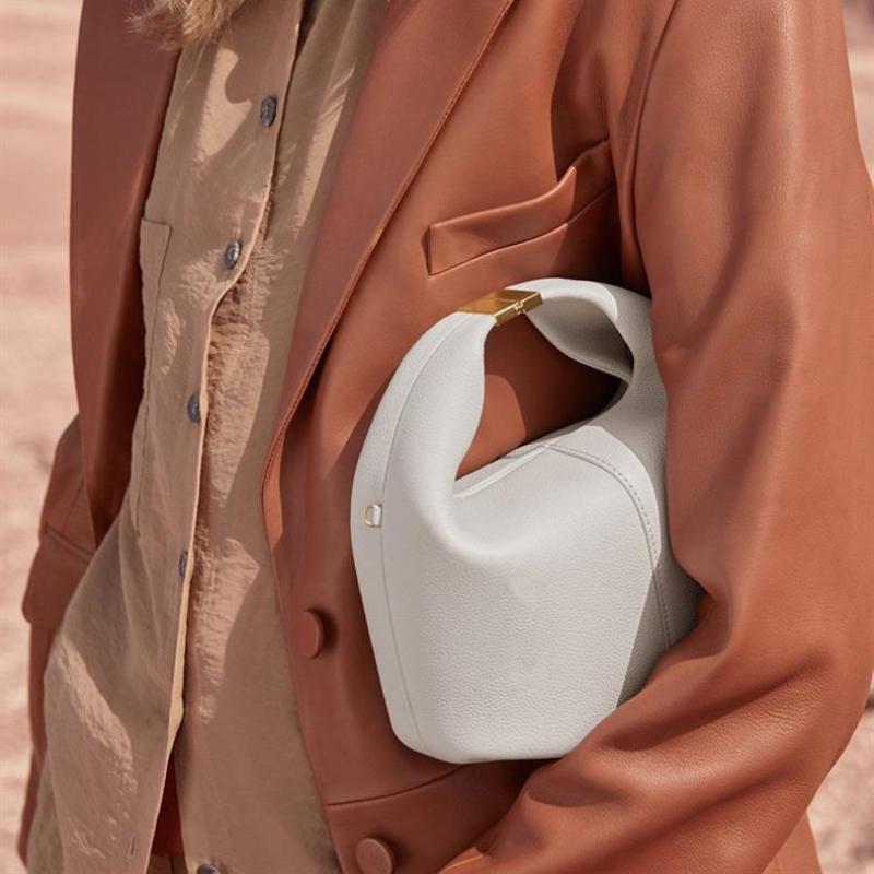 Europeisk amerikansk retro håndveske for kvinner 2024 vår og sommer New Lady Bøtteveske Høykvalitets PU tøyveske Kan håndholdt crossbody og enkelt skulder