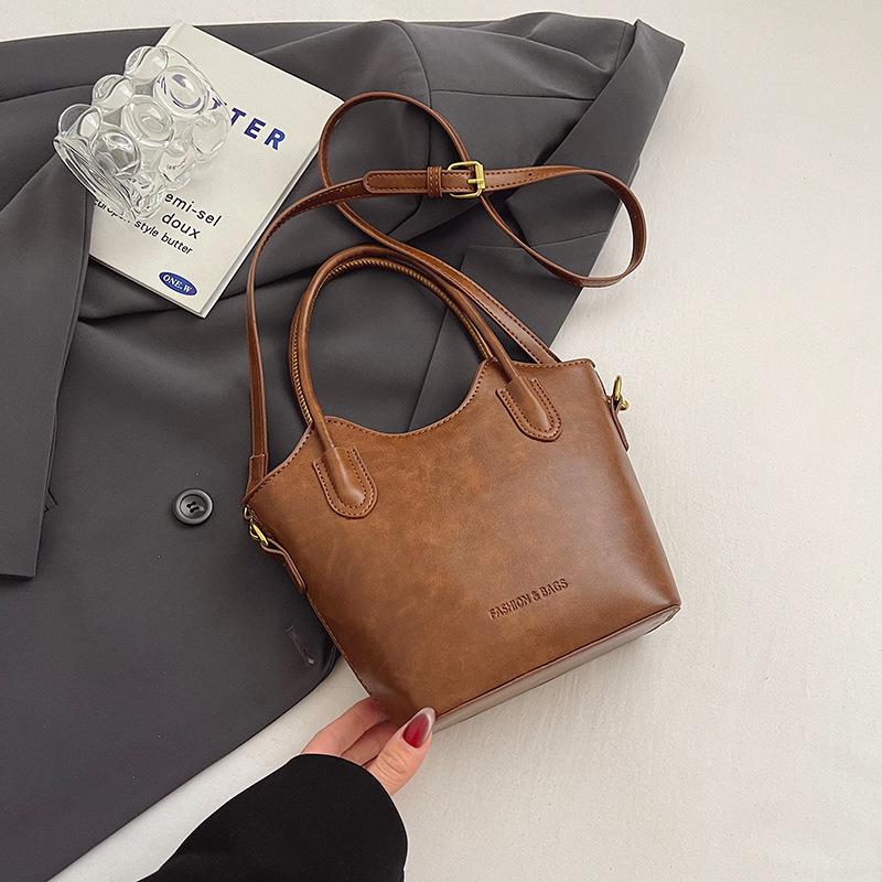 Women's winter new fashion simple solid color texture portable bucket bag daily commute shoulder messenger bag