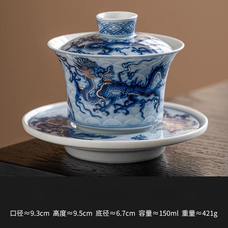 

1 set of high-end Chinese ceramic gold silver blue and white dragon patterned three piece covered bowl Kung Fu tea set