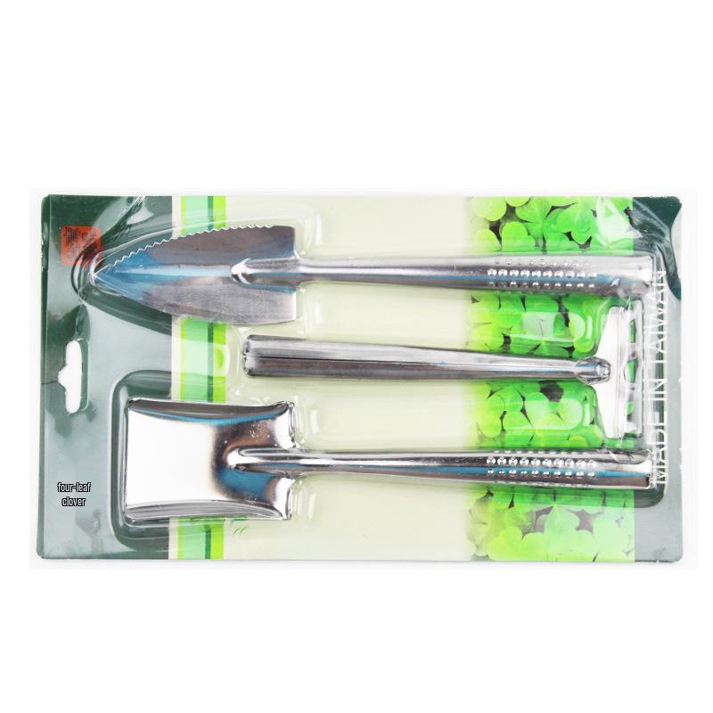 Gartenwerkzeug-Set aus Edelstahl: Schaufel, Hacke und Rechen für Blumen und Topfpflanzen.