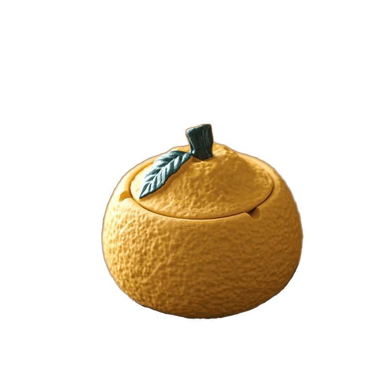 Resin Orange Ashtray with Lid - Stylish, Anti-Fly, High-Value Ornament for Home or Office.