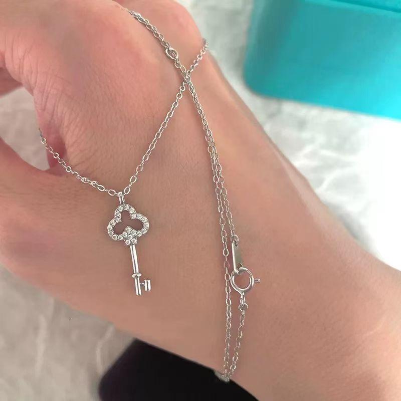 

Jkeli S925 Sterling Silver Shiny Zircon Cute Key Pendant Necklace for Women Fashion Simple Daily Wear Choker Jewelry Accessories 45cm белого золота