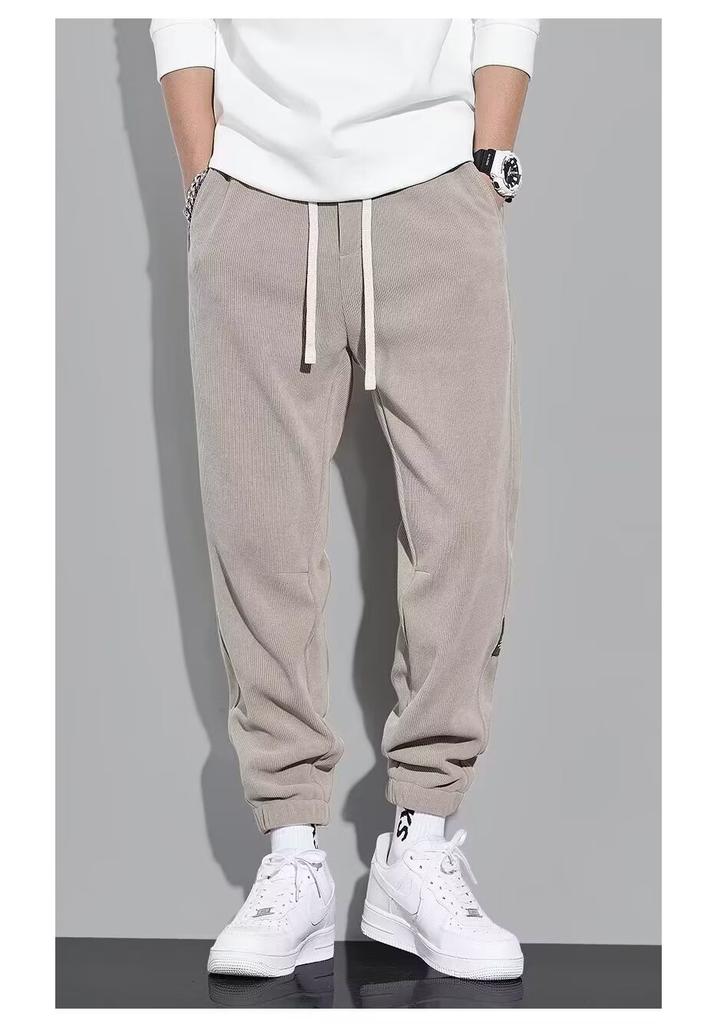 Fleece tied feet casual pants men's autumn and winter thickened men's casual sports pants Korean version loose nine-point pants