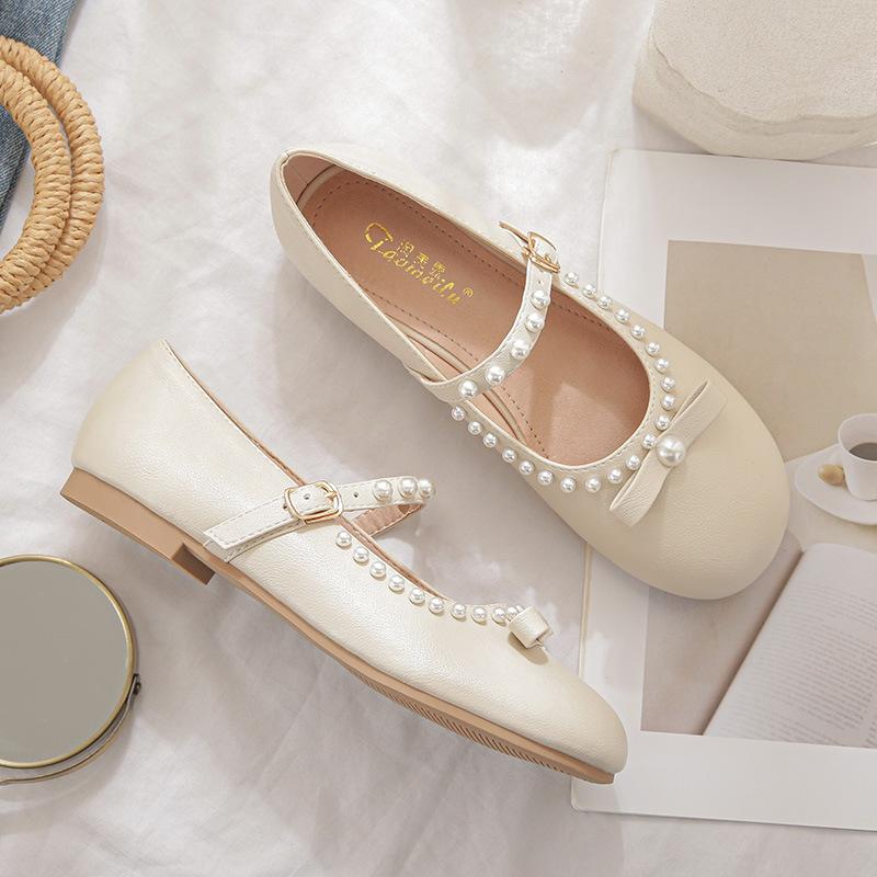 

00-16 Summer new flat-bottomed flat-heeled round head Korean version of pearl bow simple and versatile comfortable large-size single shoes 33 абрикосовый