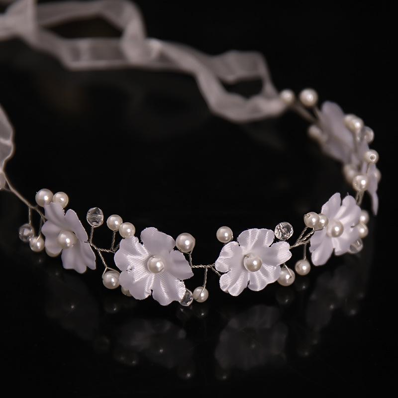 

Tuanming Minimalist Pearl Flower Hairband for Updo or Dress-Up