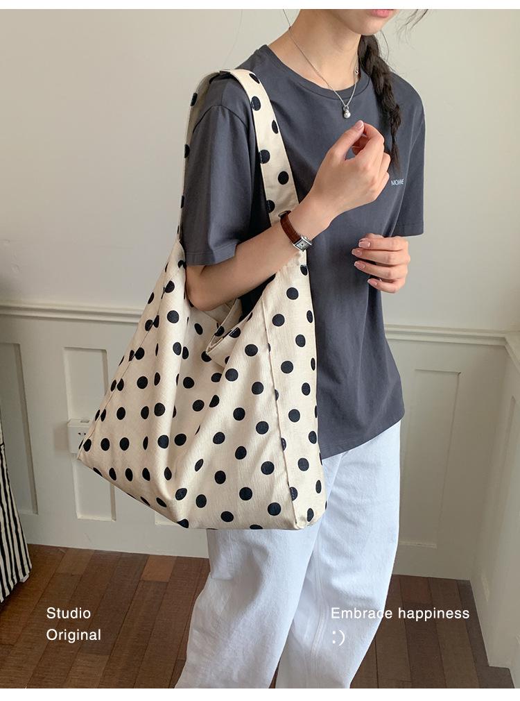 2026 Chic Polka Dot Underarm Bag: Korean Style, Versatile Women's Handbag with Unique Design.