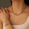 Stylish Gold-Plated Titanium Steel Multi-Layer Snake Chain Jewelry Set with Cross Bead Clasp