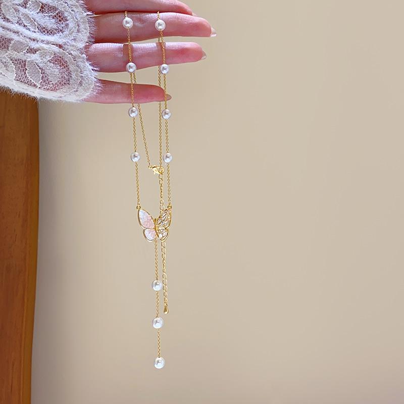 Schmetterlingsquaste Perlenanhänger Halskette: Elegante High-End Schlüsselbeinkette für Damen