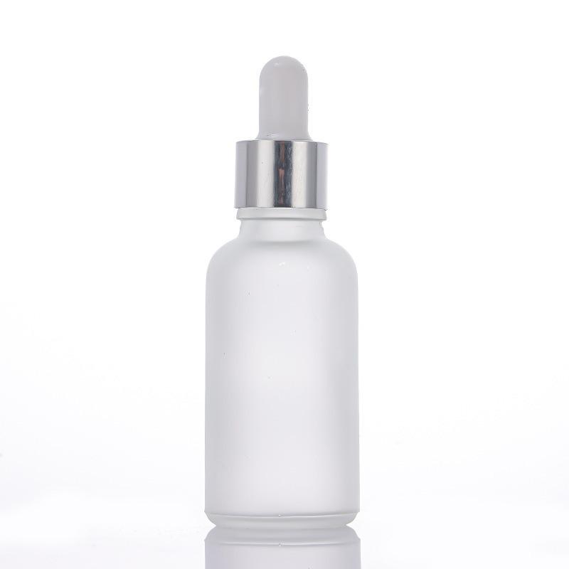 Reiseflasche für ätherische Öle aus Milchglas mit Gummitropfer