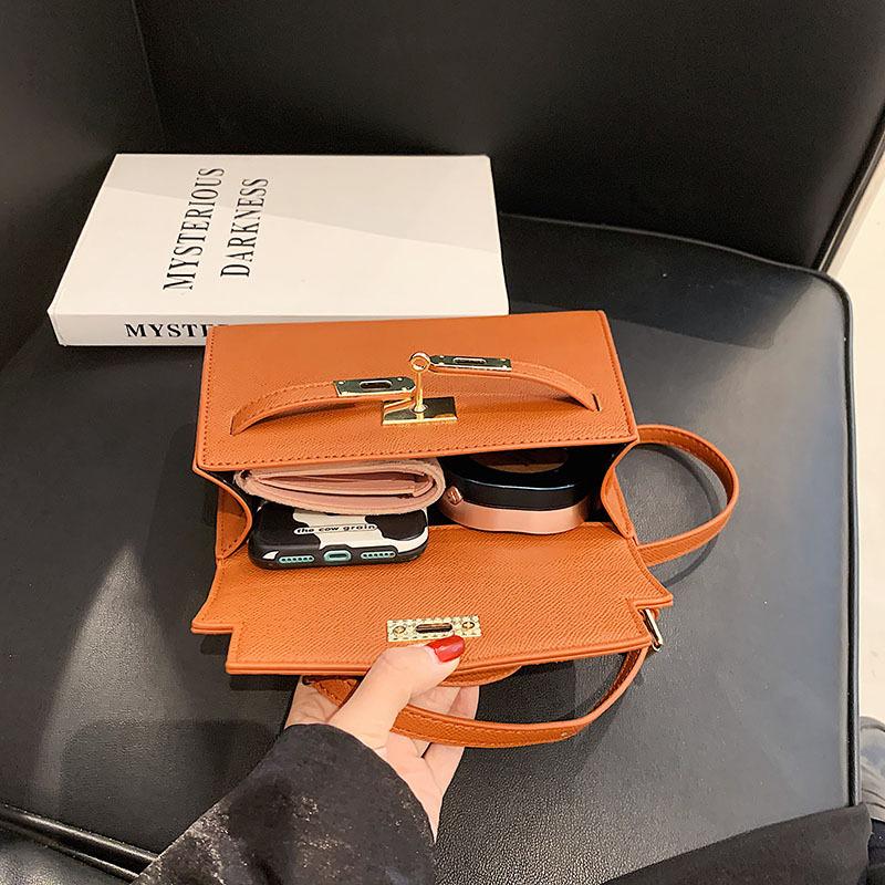French niche lychee pattern handbag women's 2026 early spring versatile Kelly bag simple commuter messenger bag