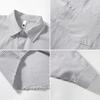 Moda Uomo Primavera 2026 Camicia a Righe Uomo Casual Larga Stile Hong Kong Camicie Uomo Monocolore Camicie Coreane a Maniche Lunghe