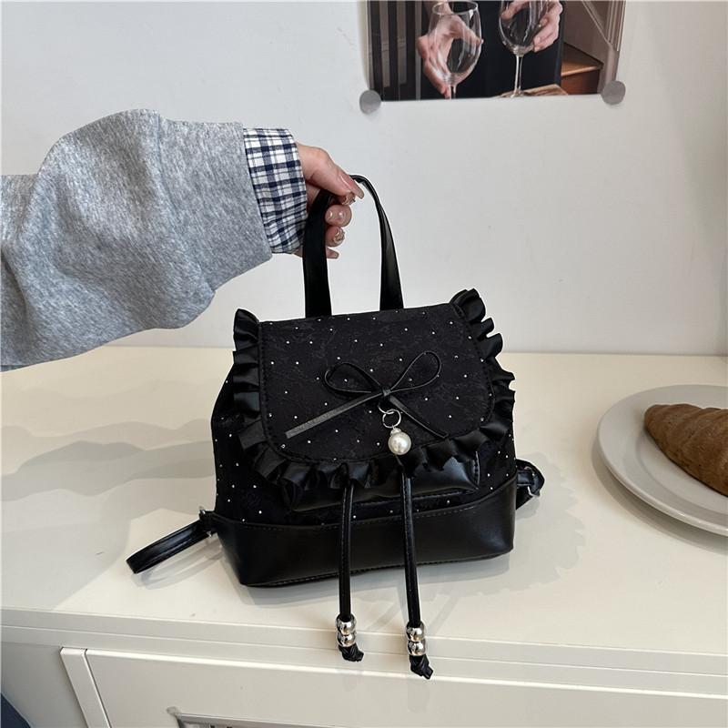 

Summer new niche high-end backpack female personality design sense casual temperament commuter backpack чорний