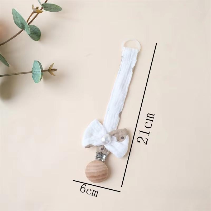 1 Stück Niedlicher Neugeborener Mädchen Schnuller Clip Kette Süße Prinzessin Schleife Schnullerclip Kette Stoff Holz Anti-Verloren Spielzeug Schnullerkette