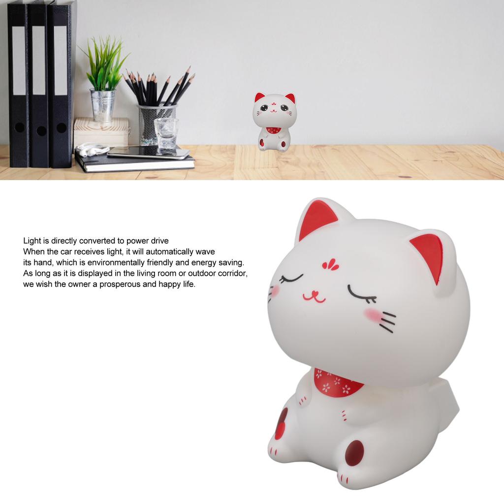 Niedliches Katzen-Ornament Solarlicht Induktion Kunststoff Glücksbringende Nickkatze für Restaurants Armaturenbrett im Auto mit Lächeln