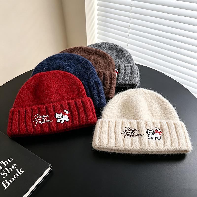 Source new cat letter embroidery knitted wool hat women's autumn and winter flanged warm cold hat stack hat