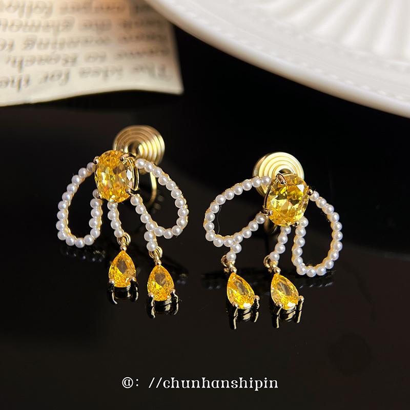 Bow pearl tassel unique pearl earrings mosquito coil disc ear clips sweet temperament stud earrings spring earrings