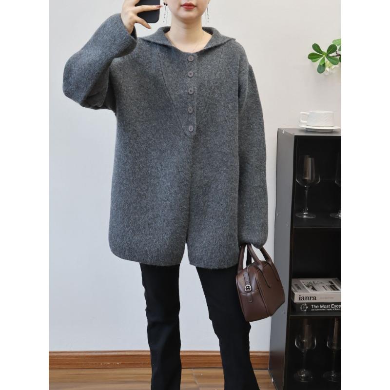 Autumn and winter new hooded design sense medium and long sweater jacket solid color loose high sense knitted cardigan women