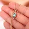 Women Oval Green Stone Pendant Necklace with Sparkling Halo Elegant Gold Chain