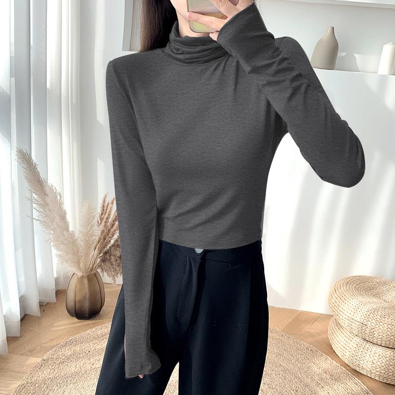 

Женская облегающая рубашка с высоким воротником и длинным рукавом M