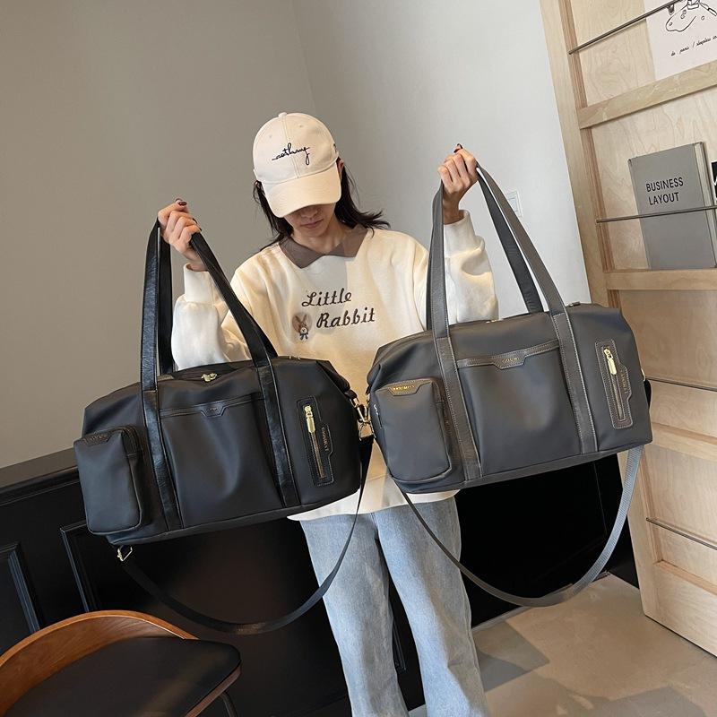 Women's outgoing travel bag Fashion large-capacity portable business trip duffel bag High value lightweight sports fitness bag Men's