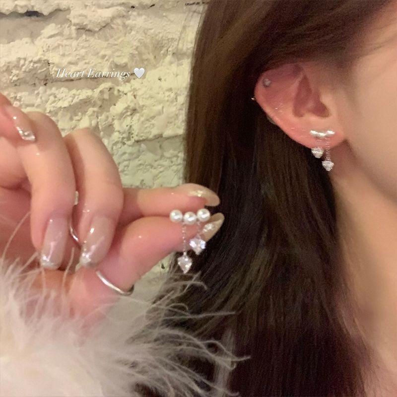 

Heart Imitation Pearl Tassel Earrings 2025 New Best Selling Fancy Accessible Luxury Niche Earrings Refined Wild Earrings Women Pair of small Heart tassels