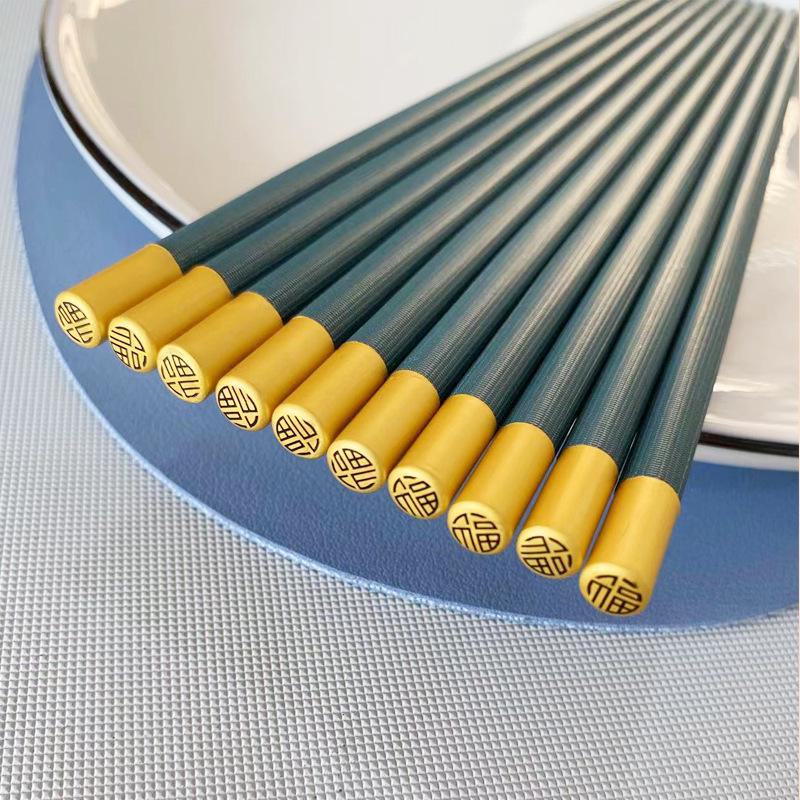 Luxurious Morandi Dark Green Non-Slip Porcelain Chopsticks for Home and Hotel Use, Mildew-Proof and Stylish Alloy Handles.