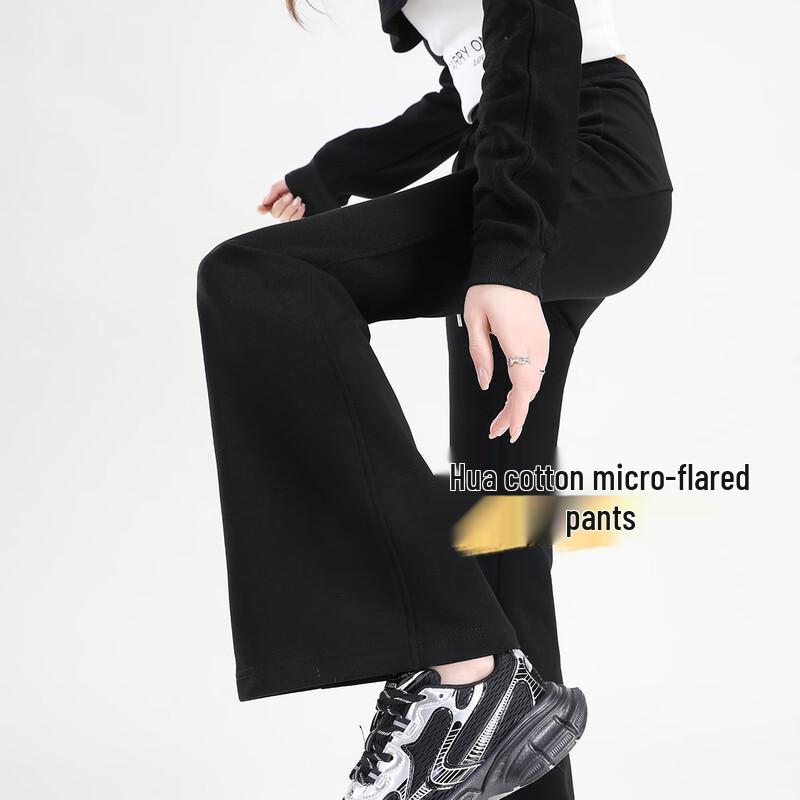 Dámské ležérní kalhoty s vysokým pasem a rozšířenými nohavicemi, které zvedají zadek