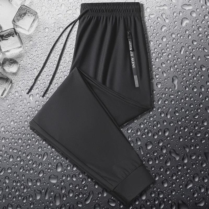 Men's Large Ice Silk Quick-Dry Pants: Cool, Thin Summer Trousers for Construction Workers and Farmers.