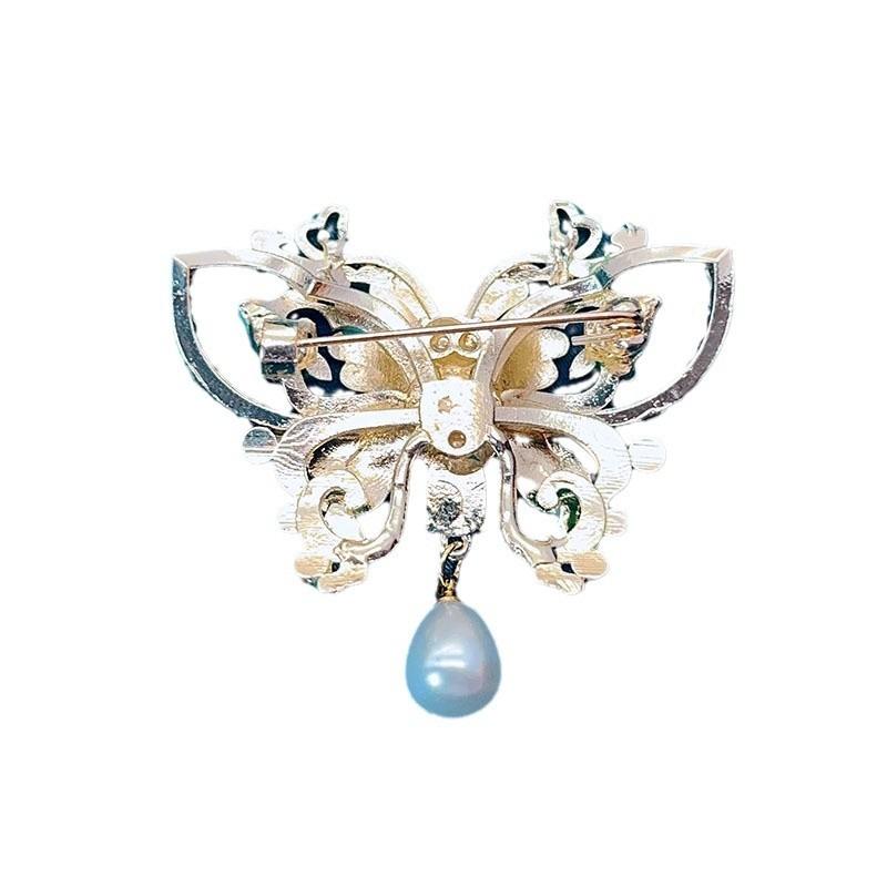 Retro enamel-colored pearl butterfly brooch - High-end, niche-style corsage fastener with anti-glare function, elegant pin.