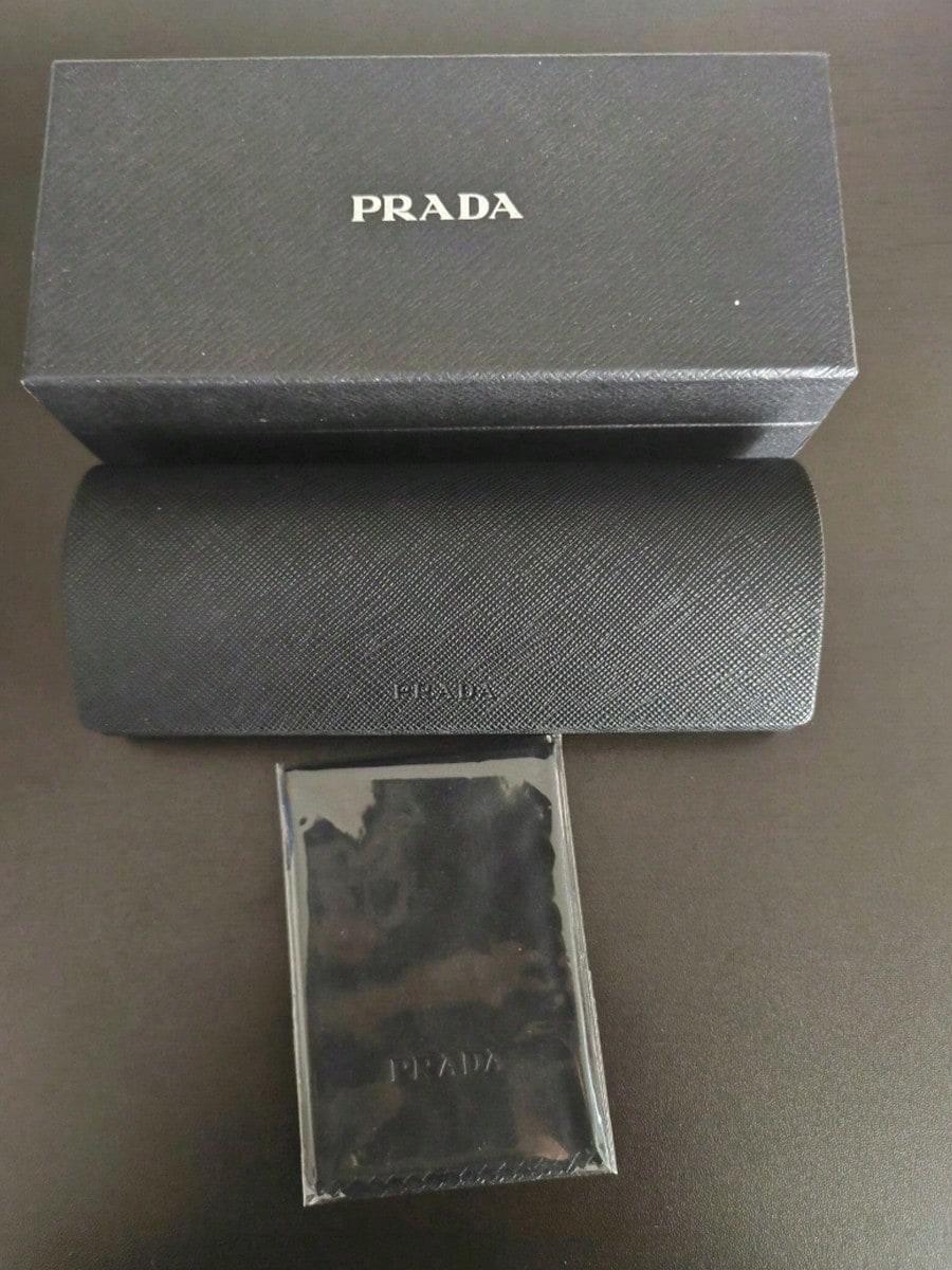 

Чорний твердий футляр для окулярів зі шкірозамінника Prada чорний