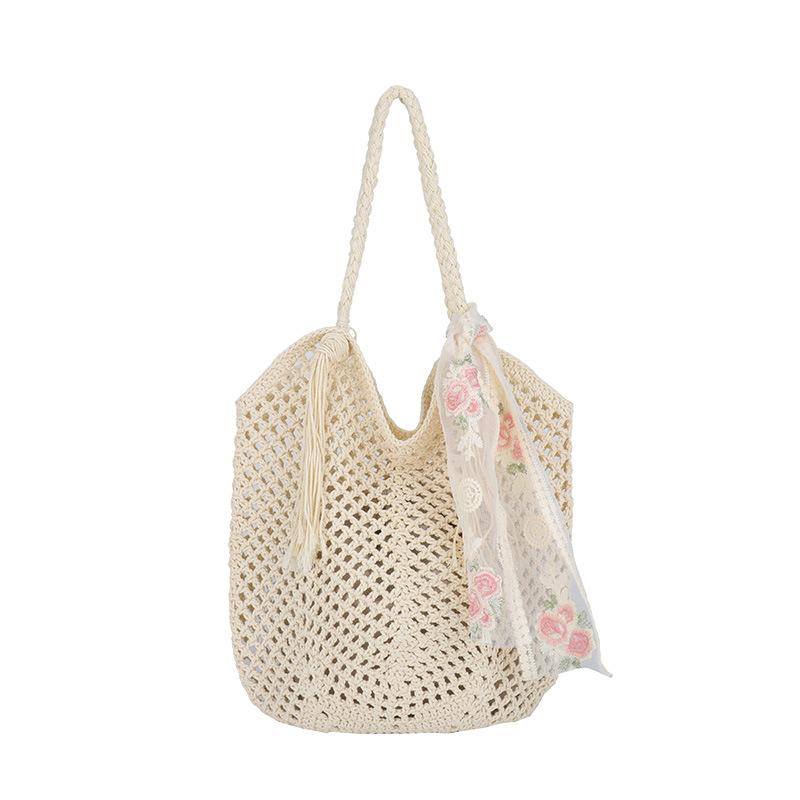 Casual large-capacity woven bag New hollow lazy wind shoulder bag Casual beach bag Women's bag