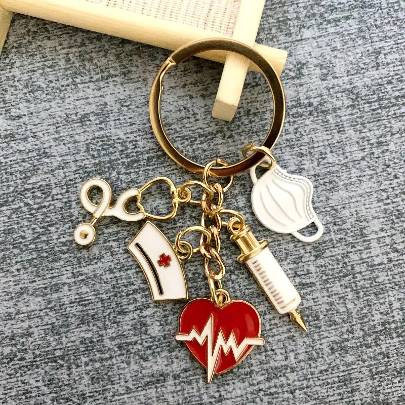 Doctor-Nurse Keychain Gift: Cap, Syringe, Stethoscope, Heart золотой