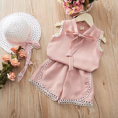 Abito a due pezzi da bambina con top floreale senza maniche