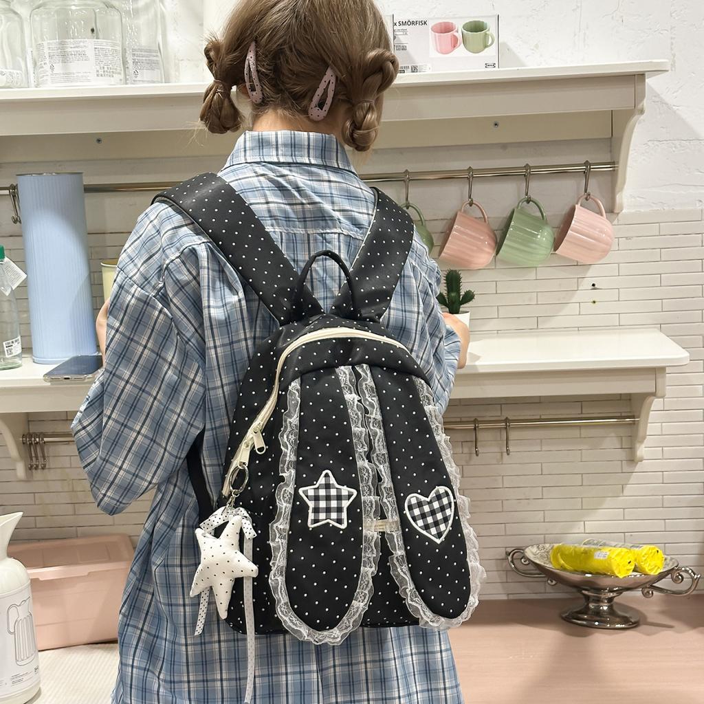 Schoolbag Korean simple foreign style polka dot love rabbit ear backpack 1011 summer new commuter student backpack