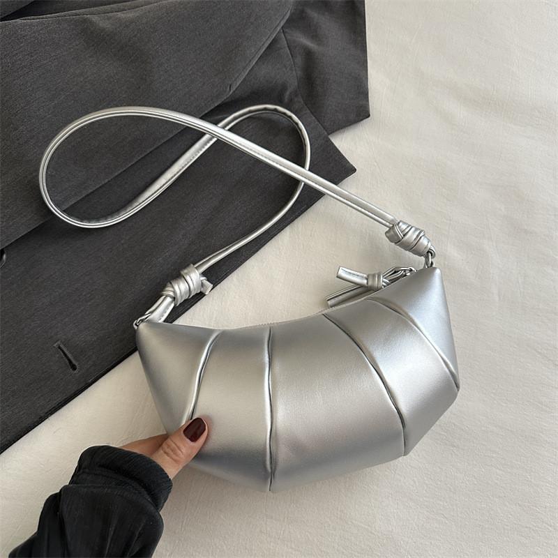

Stylish And Trendy Dumpling Crossbody Bag In Various Colors Ideal For Everyday Use срібний
