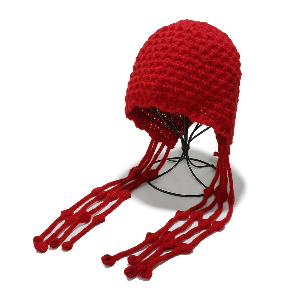 Autumn and winter warm wool hat, hand-woven hollow bag head hat, women's ethnic style fringed ear protector, knitted hat, women