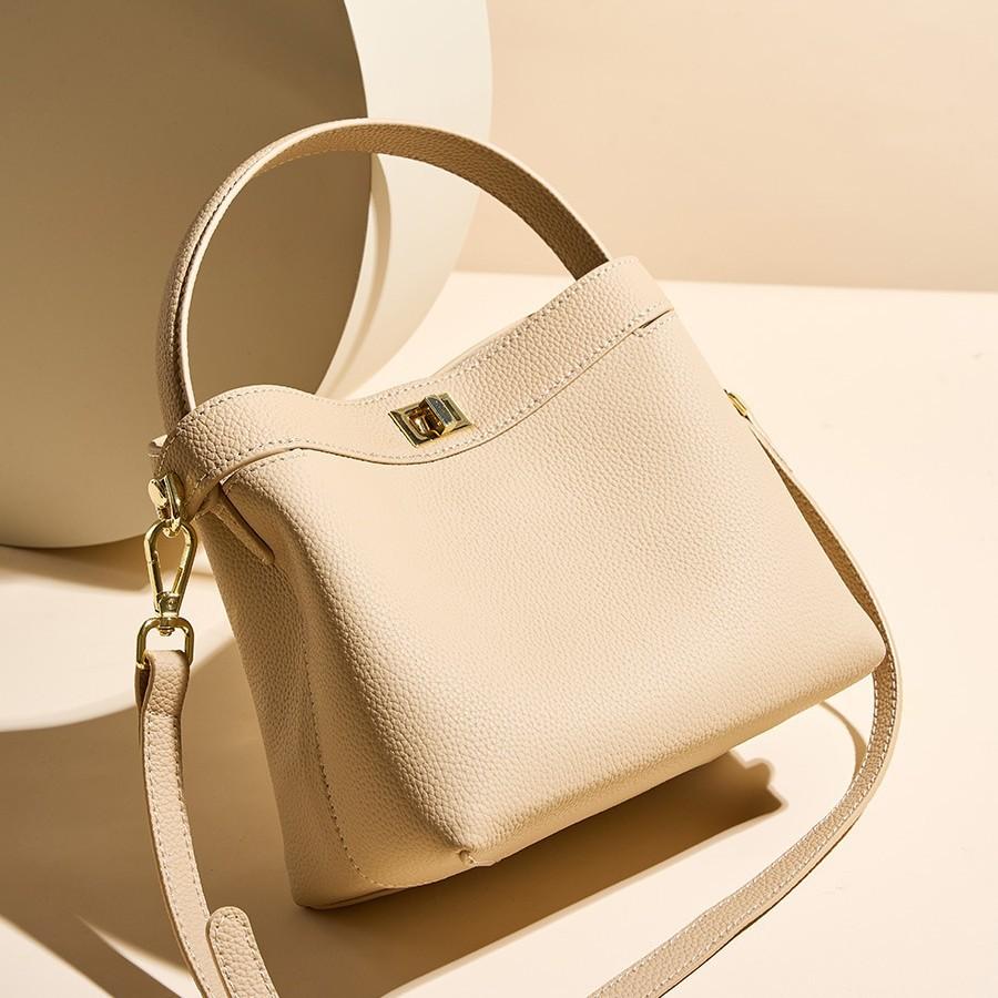 Niche design commuter handbag, high-end genuine leather crossbody bucket bag, single shoulder women's ins-style bucket bag