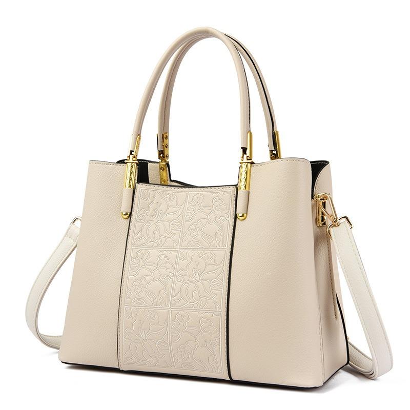 

Высококачественные женские сумки из кожи с вышивкой в национальном стиле 2024 года, новые сумки для женщин среднего возраста через плечо, вместительная портативная сумка-мессенджер для мам бежевый