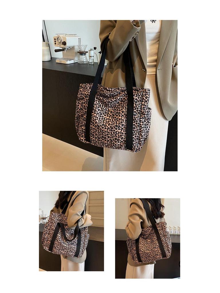 Leopard Print Canvas Tote: Large Capacity Autumn Shoulder Bag for Women, Versatile for College and Commute.