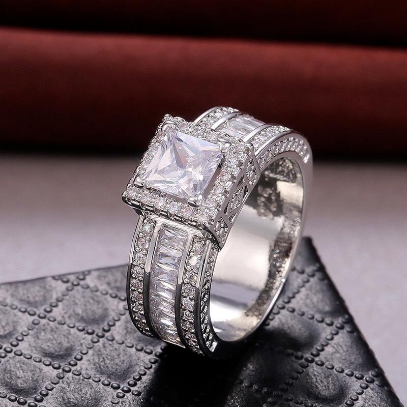 Bague de mariage Super brillante pour hommes et femmes, couleur argent exquise, pierres de Zircon incrustées, bijoux de fiançailles